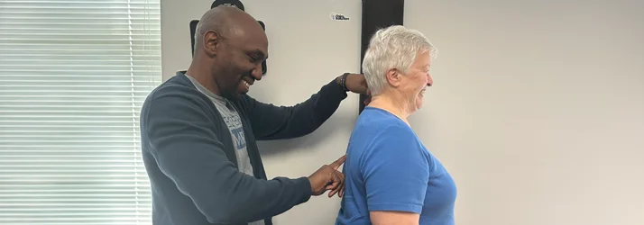 Dr. Cooley and a patient smiling during an exam as part of the ABC technique