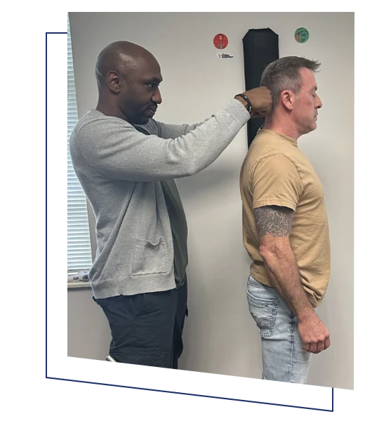 Chiropractor North Chesterfield VA James Cooley Examining Patient HP v2