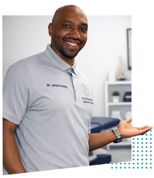 Dr. James Cooley with hand outstretched, welcoming patients to the clinic