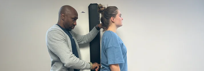 Dr. James Cooley using the ABC technique to examine a patient's spine